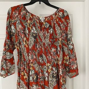 Tunic with flared sleeves.  New w/o price tags.